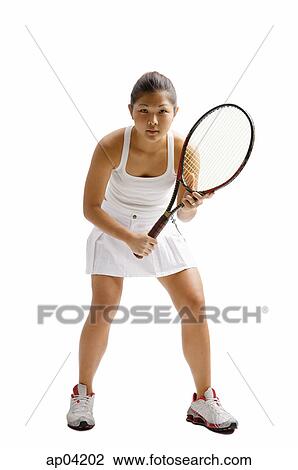 Young woman playing tennis View Large Photo Image Stock Image - Young woman playing tennis. Fotosearch