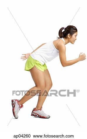 Young woman running View Large Photo Image Stock Image - Young woman running. Fotosearch