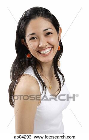 Young woman smiling at camera View Large Photo Image Stock Image - Young woman smiling at camera . Fotosearch
