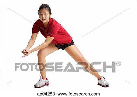 Young woman waiting for volleyball to come her way, hands clasped View Large Photo Image Stock Image - Young woman waiting for volleyball to come her way, hands clasped. Fotosearch