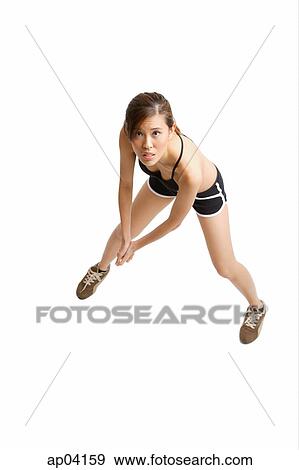 Young woman waiting to hit ball View Large Photo Image Stock Photo - Young woman waiting to hit ball. Fotosearch