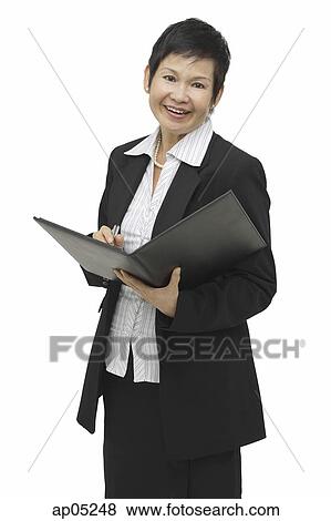 Businesswoman with folder and pen, portrait View Large Photo Image Stock Photo - Businesswoman with folder and pen, portrait. Fotosearch