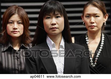 Businesswomen in a row View Large Photo Image Stock Image - Businesswomen in a row. Fotosearch