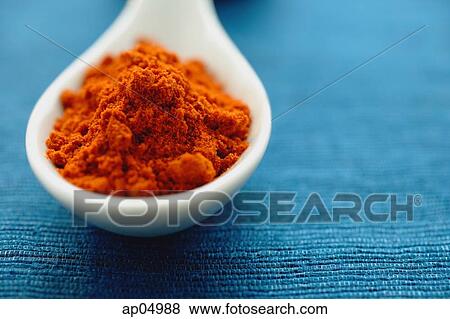 Chili powder in ceramic spoon, close- up View Large Photo Image Stock Photo - Chili powder in ceramic spoon, close- up. Fotosearch