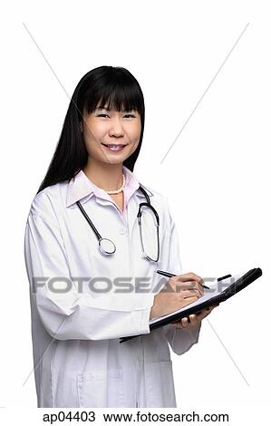 Doctor with medical chart, smiling at camera View Large Photo Image Stock Image - Doctor with medical chart, smiling at camera. Fotosearch