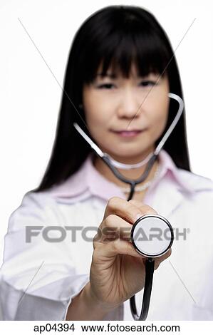 Doctor with stethoscope, selective focus View Large Photo Image Picture - Doctor with stethoscope, selective focus. Fotosearch