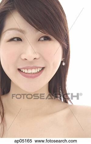 Stock Photography - Head shot of woman, smiling, portrait. Fotosearch