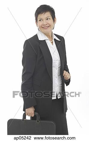 Mature businesswoman with briefcase, looking away View Large Photo Image Stock Image - Mature businesswoman with briefcase, looking away. Fotosearch
