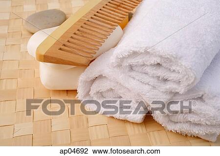 Still life of bath toiletries, comb, bar of soap and towel View Large Photo Image Stock Image - Still life of bath toiletries, comb, bar of soap and towel. Fotosearch