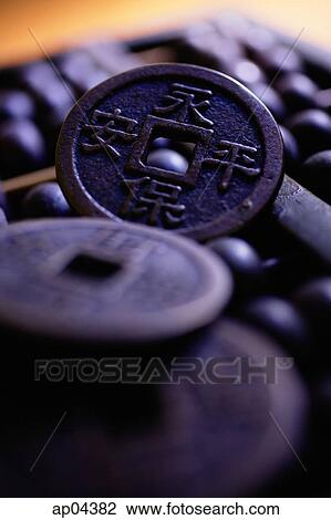 Stock Image - Still life of Chinese coin. Fotosearch