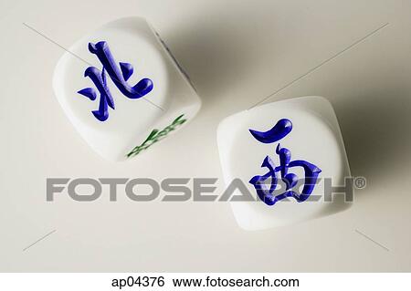 Still life of Chinese dice with the words 'North' and 'West' View Large Photo Image Stock Photograph - Still life of Chinese dice with the words 'North' and 'West'. Fotosearch