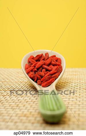 Still life of Chinese soup spoon with dried berries View Large Photo Image Stock Photo - Still life of Chinese soup spoon with dried berries. Fotosearch