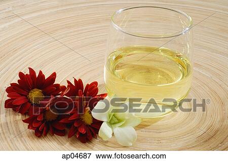 Still life of drink and flowers on a tray View Large Photo Image Stock Photo - Still life of drink and flowers on a tray. Fotosearch