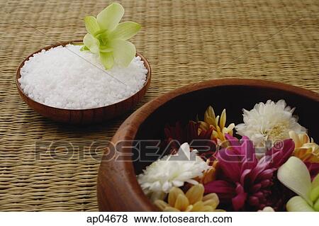 Still life of flowers in bowl and a single flower head on bowl of rice View Large Photo Image Stock Photo - Still life of flowers in bowl and a single flower head on bowl of rice. Fotosearch