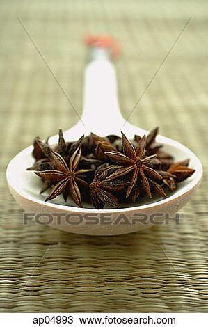 Stock Image - Still life of Star Anise in spoon. Fotosearch