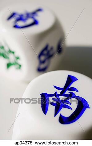 Stock Photo - Two Chinese dice with the words 'South'. Fotosearch
