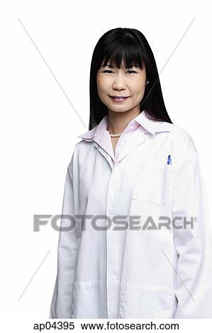 Stock Photography - Woman in lab coat, portrait. Fotosearch