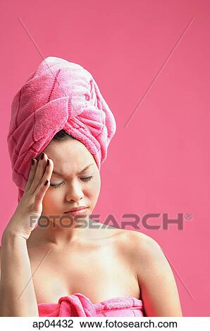 Woman wearing pink turban, frowning, eyes closed View Large Photo Image Stock Image - Woman wearing pink turban, frowning, eyes closed. Fotosearch