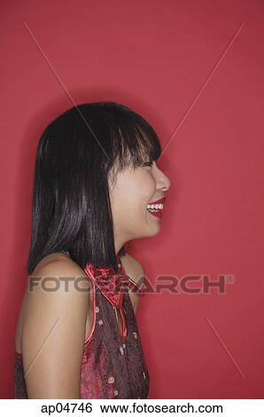 Woman with bob haircut, smiling, side view View Large Photo Image Stock Photograph - Woman with bob haircut, smiling, side view. Fotosearch