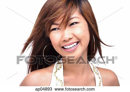 Young woman smiling at camera View Large Photo Image Stock Image - Young woman smiling at camera. Fotosearch