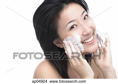Young woman with soap on her face View Large Photo Image Picture - Young woman with soap on her face. Fotosearch