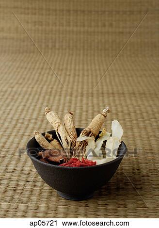 Bowl filled with Chinese medicinal herbs, still life View Large Photo Image Stock Image - Bowl filled with Chinese medicinal herbs, still life. Fotosearch