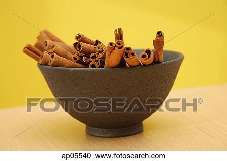 Bowl with cinnamon sticks View Large Photo Image Stock Image - Bowl with cinnamon sticks. Fotosearch