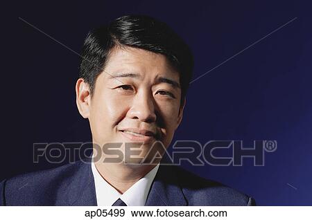 Stock Photo - Businessman, head shot. Fotosearch