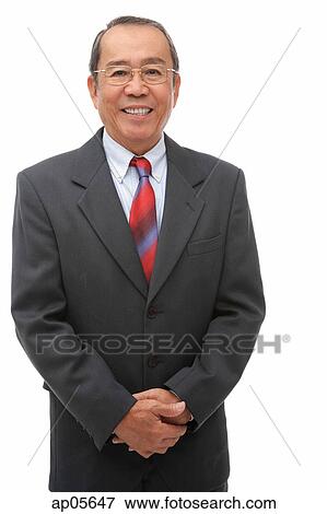 Businessman smiling at camera View Large Photo Image Stock Photo - Businessman smiling at camera. Fotosearch
