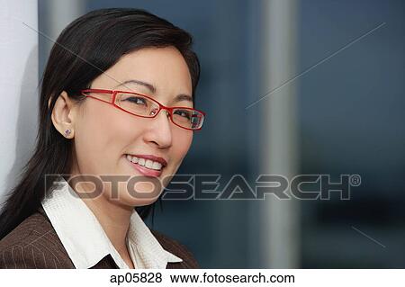 Businesswoman smiling, head shot View Large Photo Image Stock Photo - Businesswoman smiling, head shot. Fotosearch