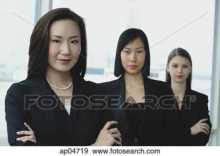 Businesswomen in a row View Large Photo Image Stock Photo - Businesswomen in a row. Fotosearch