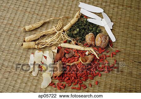 Stock Image - Chinese medicinal herbs, still life. Fotosearch