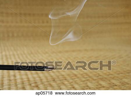Close up of burning incense sticks View Large Photo Image Stock Photo - Close up of burning incense sticks. Fotosearch