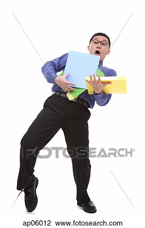 Clumsy businessman carrying folders View Large Photo Image Stock Image - Clumsy businessman carrying folders. Fotosearch