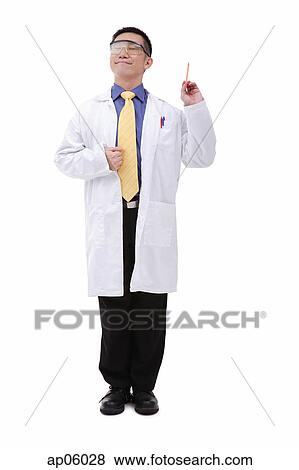 Stock Photo - Doctor in lab coat holding pencil. Fotosearch