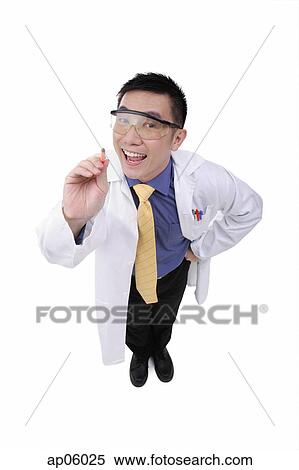 Doctor in lab coat pointing with pencil View Large Photo Image Stock Photography - Doctor in lab coat pointing with pencil. Fotosearch