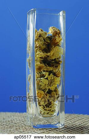 Glass containers with dried tea leaves View Large Photo Image Stock Photo - Glass containers with dried tea leaves. Fotosearch