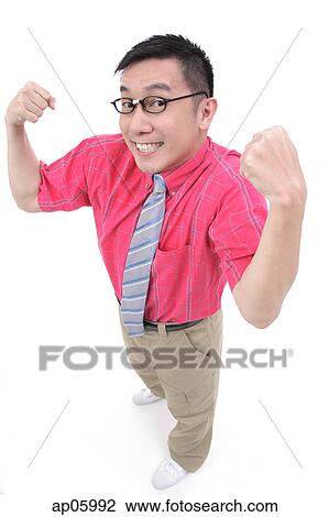 Man flexing his arms, smiling at camera View Large Photo Image Stock Image - Man flexing his arms, smiling at camera. Fotosearch