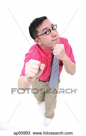 Man in boxing pose, looking at camera View Large Photo Image Stock Image - Man in boxing pose, looking at camera. Fotosearch
