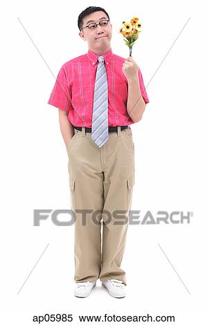 Man in shirt and tie, holding flower bouquet View Large Photo Image Stock Photography - Man in shirt and tie, holding flower bouquet. Fotosearch