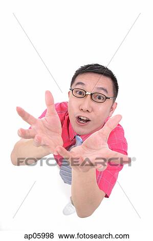 Man looking at camera, showing hands View Large Photo Image Stock Photo - Man looking at camera, showing hands. Fotosearch