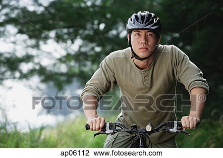 Stock Image - Man on a bicycle. Fotosearch