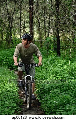 Man on a mountain bike View Large Photo Image Stock Image - Man on a mountain bike. Fotosearch