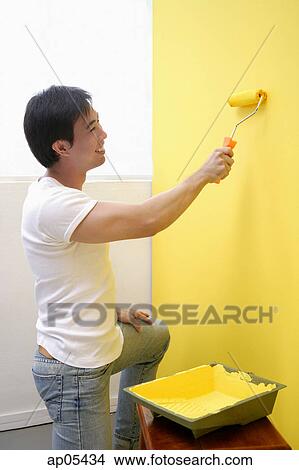 Man painting wall View Large Photo Image Picture - Man painting wall. Fotosearch