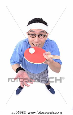 Stock Image - Man with ping-pong racket and ball. Fotosearch
