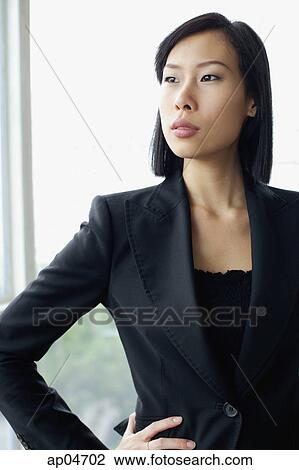 Portrait of businesswoman, hand on hip View Large Photo Image Stock Image - Portrait of businesswoman, hand on hip. Fotosearch