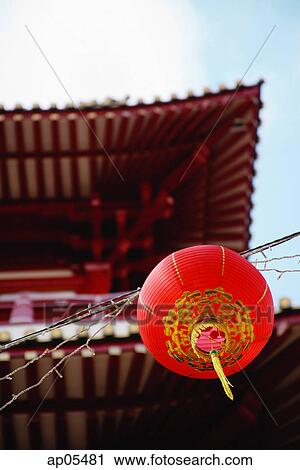 Red lantern hanging from wire View Large Photo Image Stock Image - Red lantern hanging from wire. Fotosearch