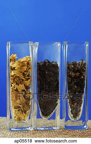 Row of three glass containers with tea leaves View Large Photo Image Stock Photo - Row of three glass containers with tea leaves. Fotosearch