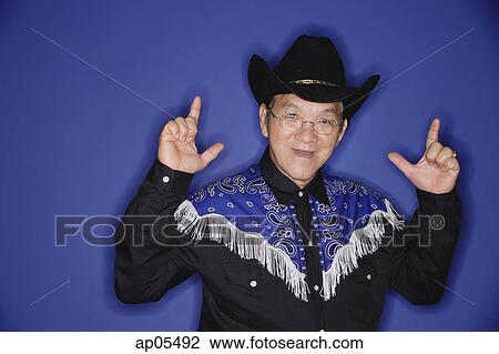 Senior man dressed in cowboy attire View Large Photo Image Stock Image - Senior man dressed in cowboy attire. Fotosearch
