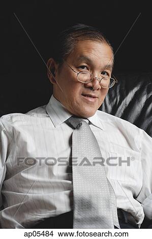 Senior man in tie, looking at camera View Large Photo Image Picture - Senior man in tie, looking at camera. Fotosearch